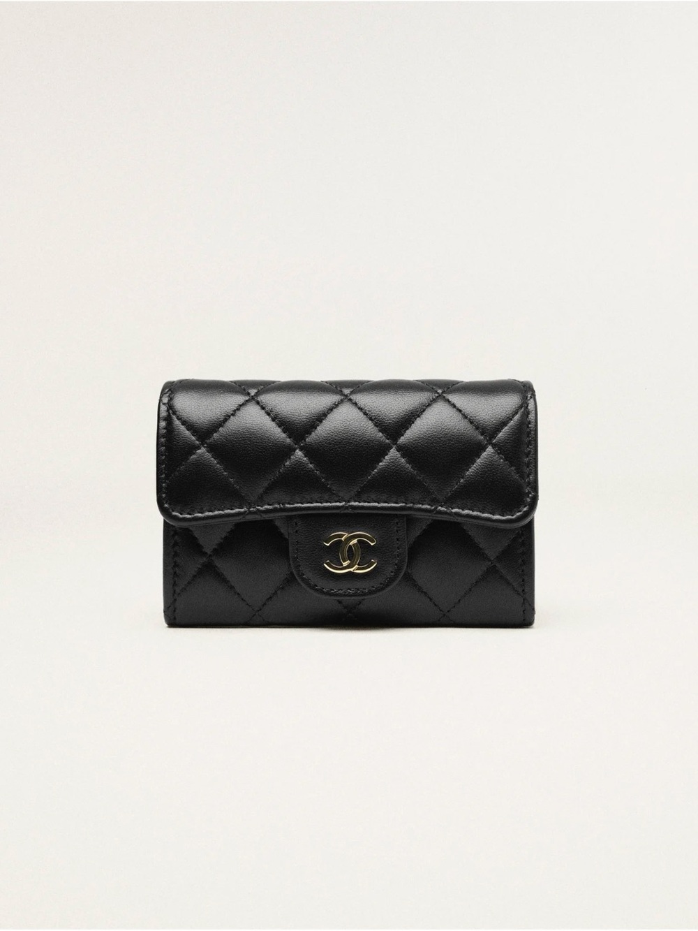 CHANEL Quilted Leather Mini Wallet in Black with Gold CC